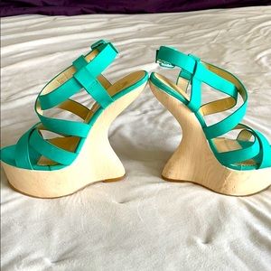 Very unique wedge style sandal in beautiful teal